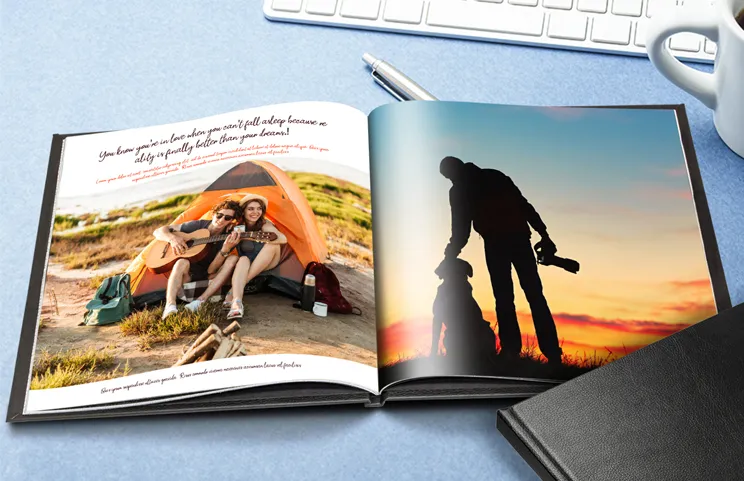Custom made photo book open on table with photo collage of family photos