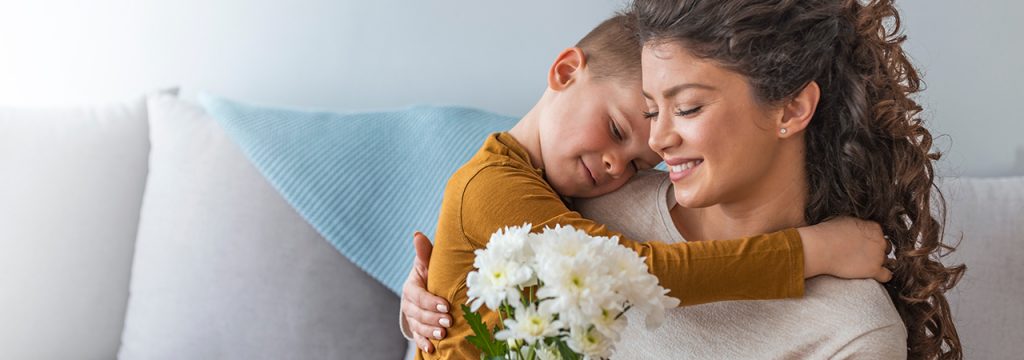 Cuddle with Mom and flowers