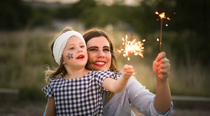 mother and child with a sparkler