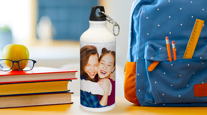 A photo bottle with a picture of two people