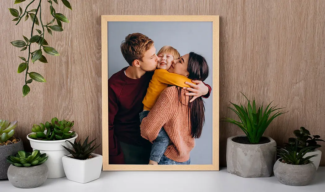 A framed family photograph on a shelf