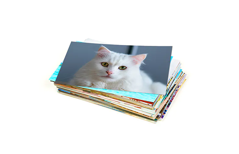 Stack of custom photo prints from the Printerpix online photo printing service