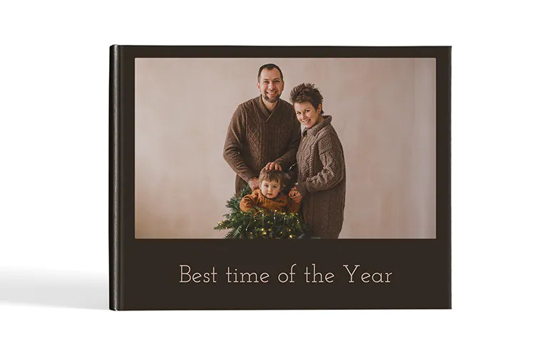 Custom printed Printerpix photo album with hard cover and large photos of young couple