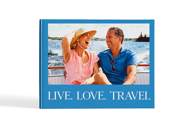 Custom printed Printerpix photo album with hard cover and large photos of young couple