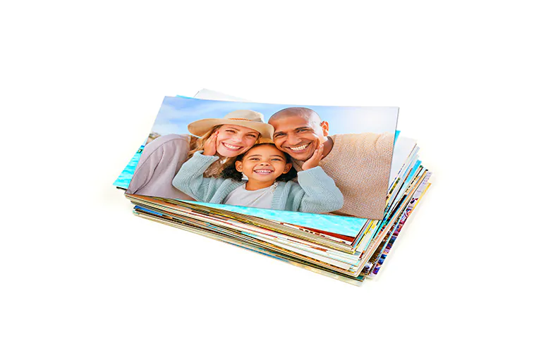 Stack of custom photo prints from the Printerpix online photo printing service