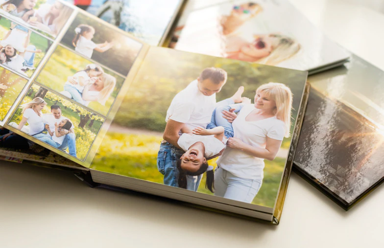 Printed personalized photo book with pictures of mother and son and photo cover