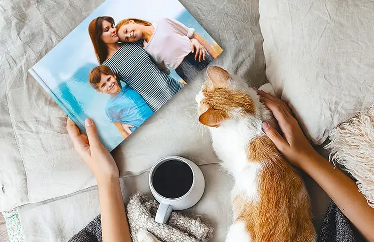 Personalized photo book printed with pictures of the football team and the photo cover