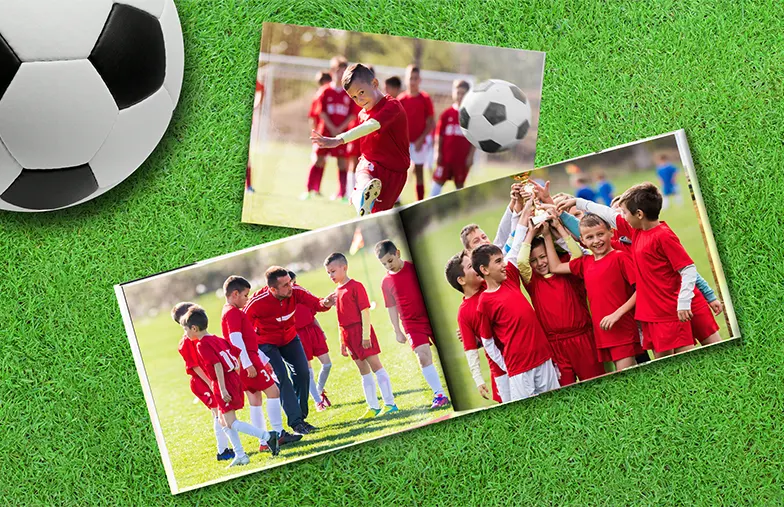 Personalized photo book printed with pictures of the football team and the photo cover