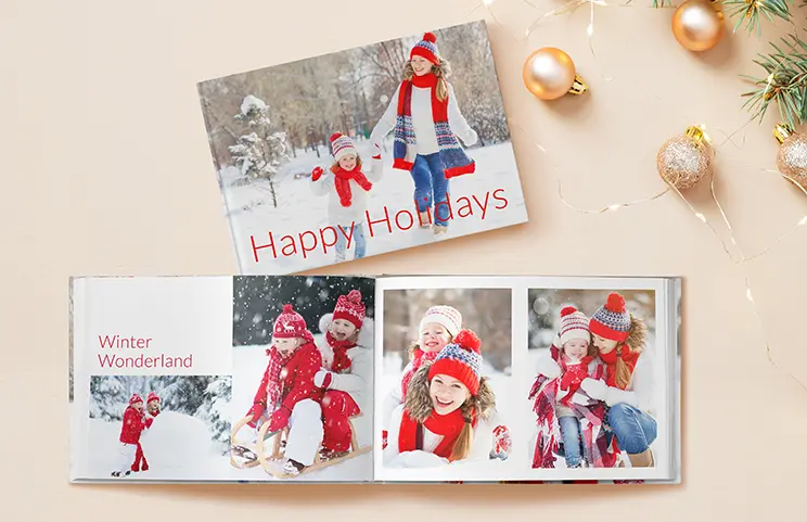 Hardcover Custom Photo Book|Custom printed Printerpix photo album with hard cover and large photos of young couple|Printed personalized photo book with pictures of mother and son and photo cover|Holiday photo album with custom photo printed cover|Personalized photo book printed with pictures of the football team and the photo cover|Family photo album with custom printed cover and family name text|||||