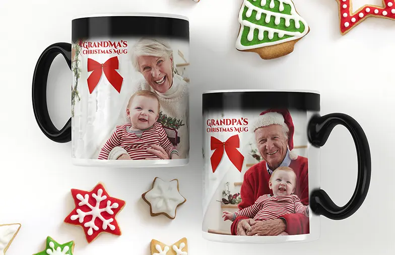 Three mugs, being filled with hot water to reveal a baby.