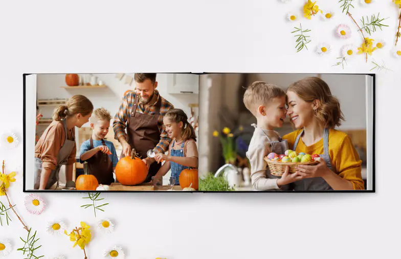 Hardcover Custom Photo Book|Custom printed Printerpix photo album with hard cover and large photos of young couple|Printed personalized photo book with pictures of mother and son and photo cover|Holiday photo album with custom photo printed cover|Personalized photo book printed with pictures of the football team and the photo cover|Family photo album with custom printed cover and family name text|||||