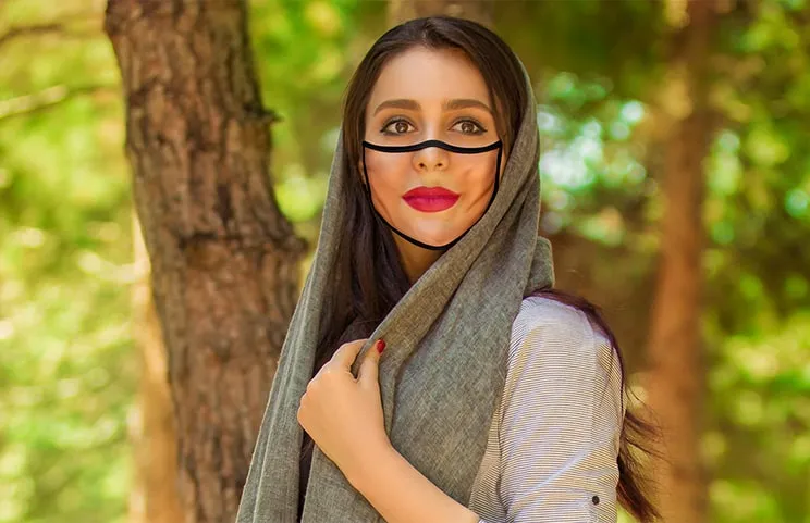 Woman with custom face mask of her face.