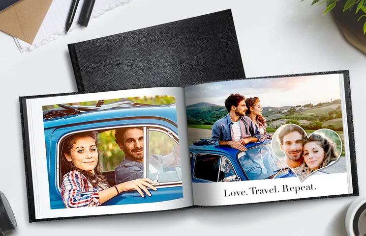 Leather Cover Custom Photo Book by Printerpix|Custom Printerpix photo book with leather cover and personalized design|Custom made photo book open on table with photo collage of family photos|Wedding and bride photos in custom printed photo album by Printerpix|Couple look at leather cover custom photo book made by Printerpix|Old couple print large custom photos in leather photo album|||||