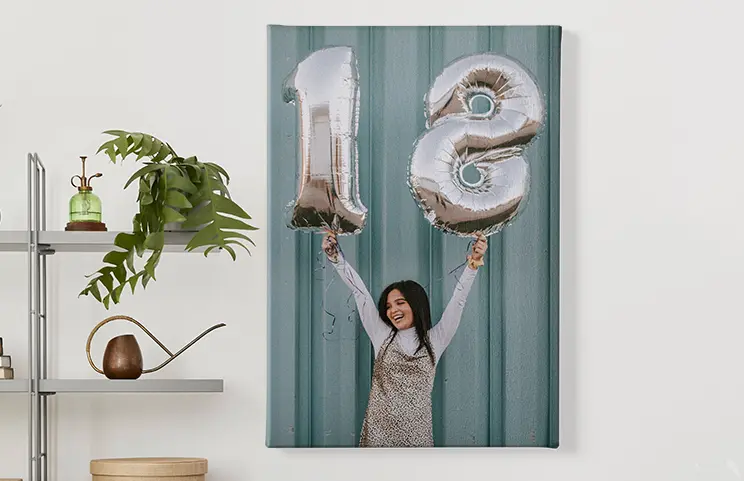 little smiling child in hood on canvas print