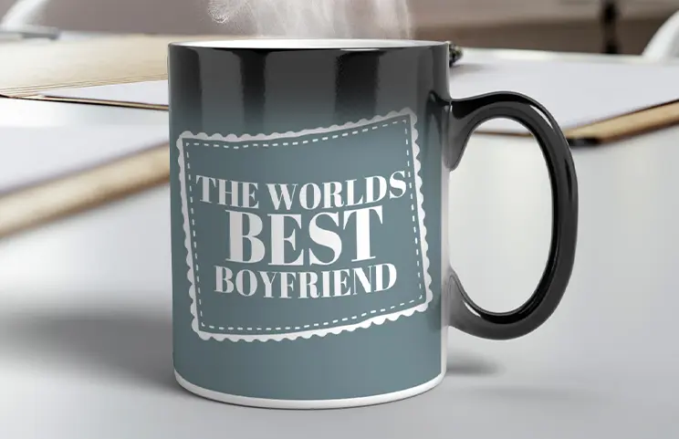 Three mugs, being filled with hot water to reveal a baby.