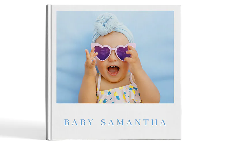 Custom printed Printerpix photo album with hard cover and large photos of young couple