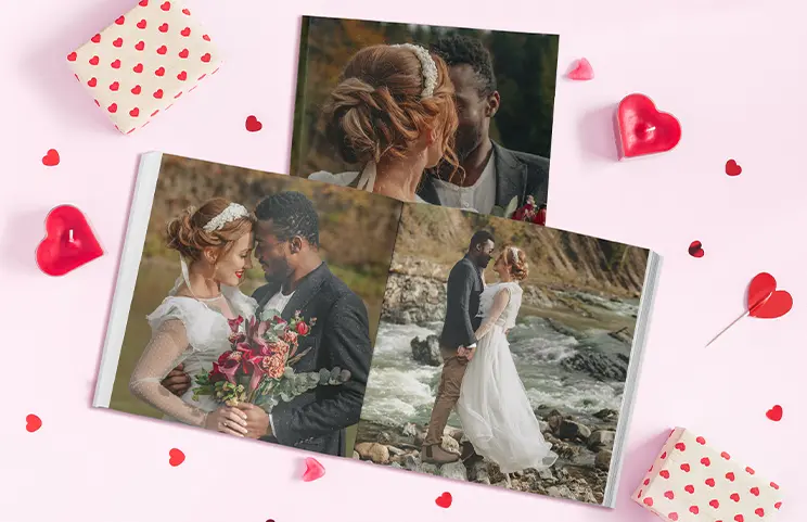 Hardcover Custom Photo Book|Custom printed Printerpix photo album with hard cover and large photos of young couple|Printed personalized photo book with pictures of mother and son and photo cover|Holiday photo album with custom photo printed cover|Personalized photo book printed with pictures of the football team and the photo cover|Family photo album with custom printed cover and family name text|||||