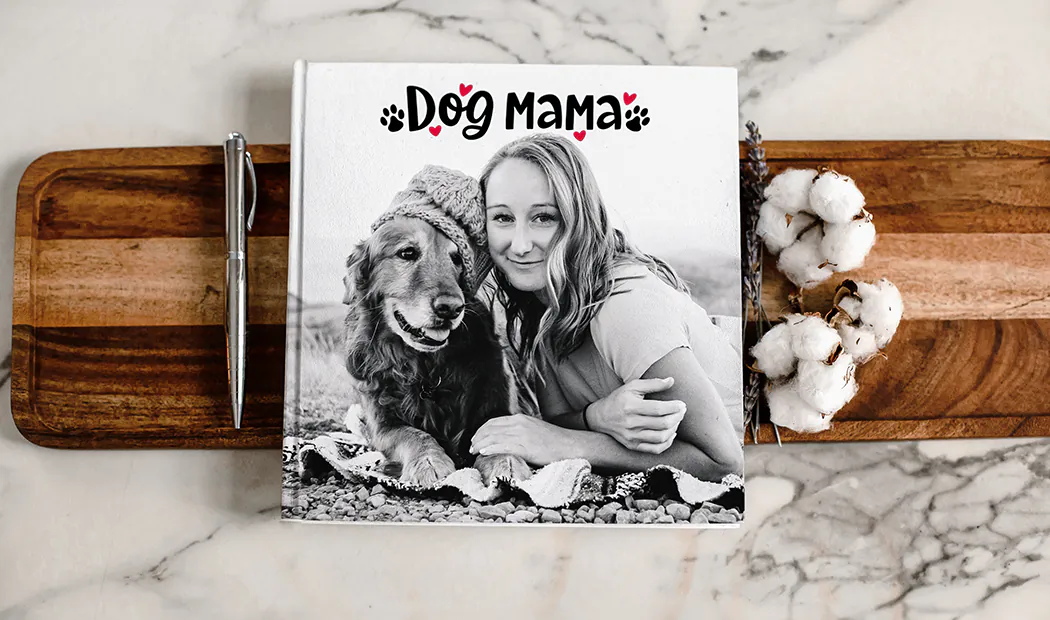 Custom printed Printerpix photo album with hard cover and large photos of young couple