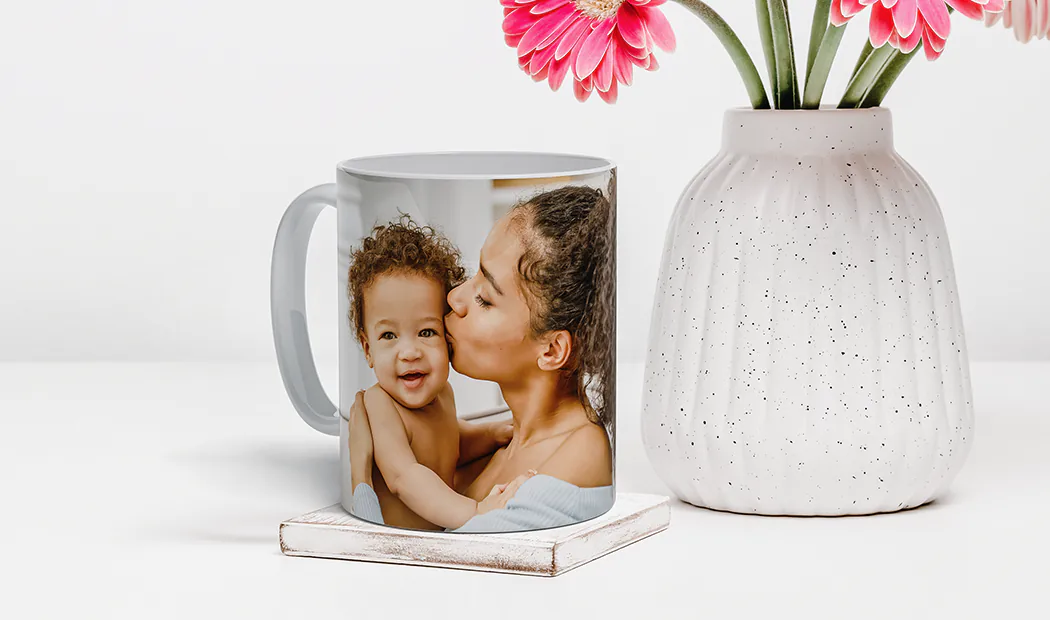 Mum and baby holding Printerpix cartoon design custom mug with dad text