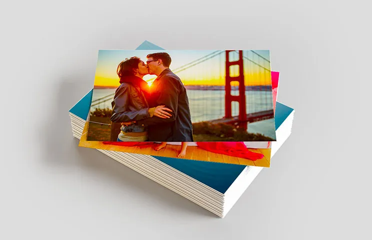 Stack of custom photo prints from the Printerpix online photo printing service