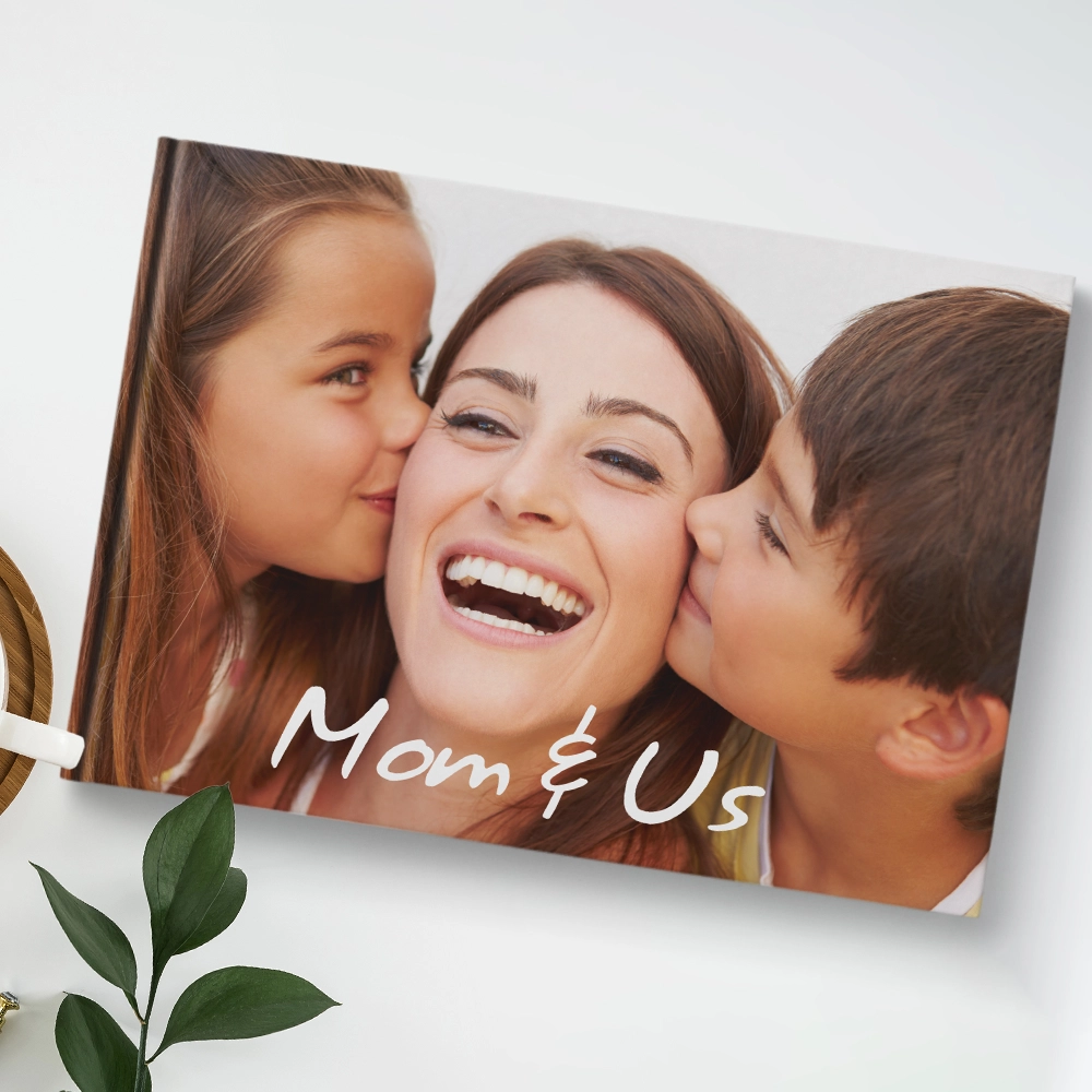 Custom printed Printerpix photo album with hard cover and large photos of young couple