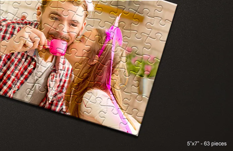 Cardboard puzzle of father and daughter