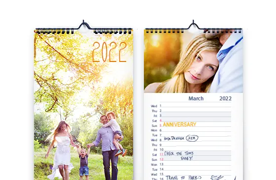 wall 2020 custom photo calendar by Printerpix|Family picture on a custom wall calendar|Woman writing on A4 customised wall calendar by printerpix with christmas theme photo|A3 2020 wall calendar hung up with personalised photo design by printerpix|Romantic couple in living room with personalised 2020 wall calendar with proposal photo|Dog photos on custom design photo calendar hung up on wall|||||