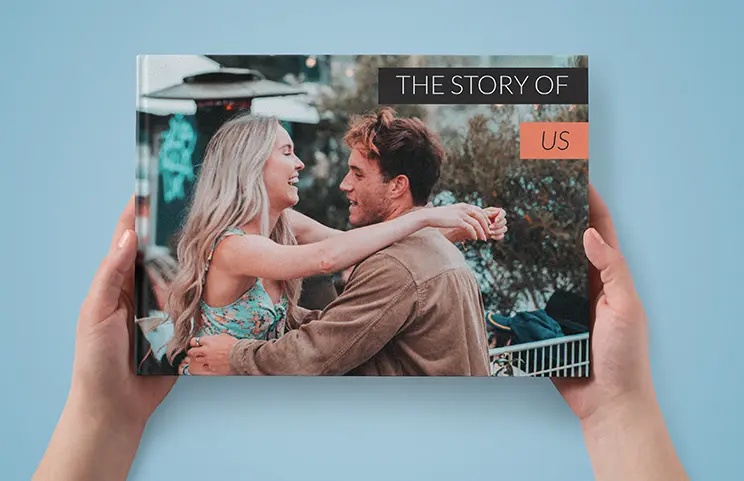 Hardcover Custom Photo Book|Custom printed Printerpix photo album with hard cover and large photos of young couple|Printed personalized photo book with pictures of mother and son and photo cover|Holiday photo album with custom photo printed cover|Personalized photo book printed with pictures of the football team and the photo cover|Family photo album with custom printed cover and family name text|||||