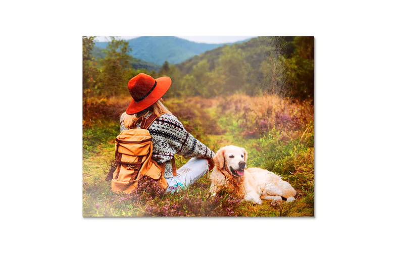 Aluminium photo print of a moutain and a lake being held by woman made by Printerpix