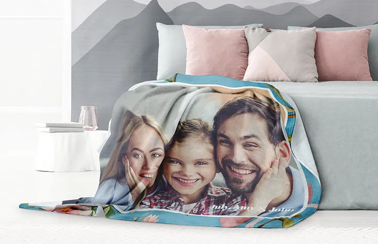 Custom Fleece Blanket by Printerpix|Custom fleece blanket of family on bed|Child holding custom fleece blanket with pets|Custom fleece blanket on a bed with family photo|Couple wrapped in custom fleece blanket|Custom fleece blanket on bed|||||