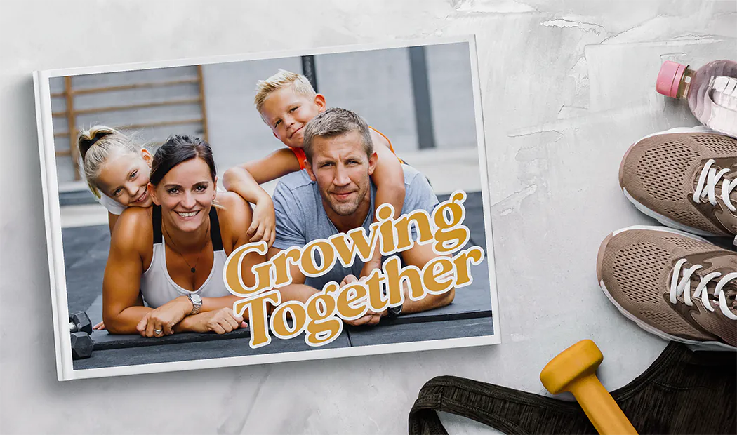 Custom printed Printerpix photo album with hard cover and large photos of young couple
