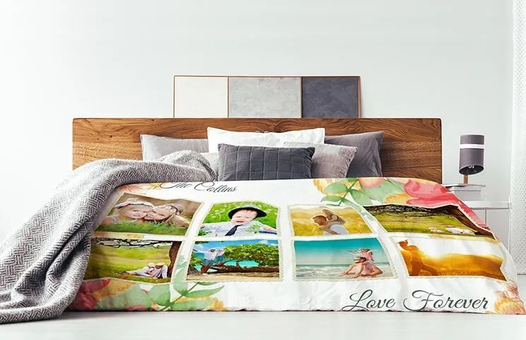 Plush throw blanket with custom design of couple photos on a sofa