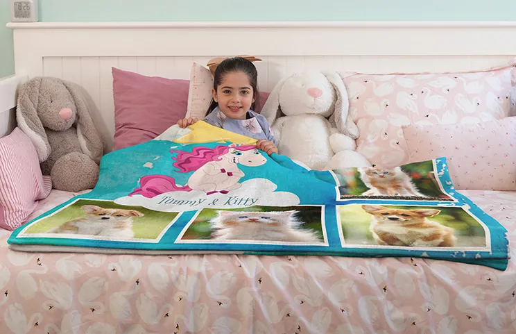 Child holding custom fleece blanket of pets