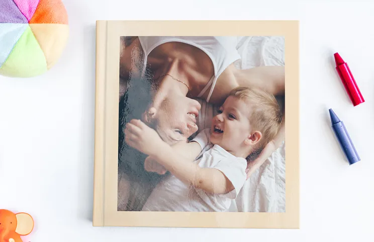Custom printed photo book with romantic pictures of a couple and photo cover