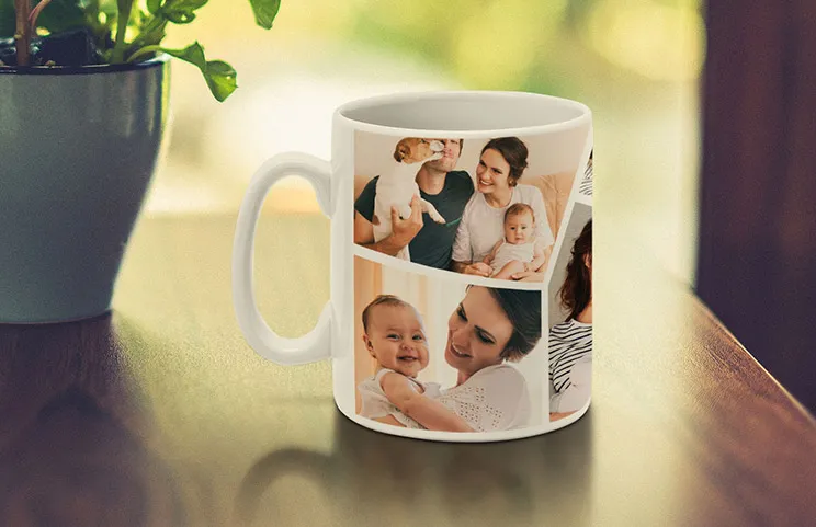 Close up of custom photo mug with a photo collage of family photos and text