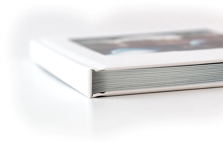 Printed personalized photo book with pictures of mother and son and photo cover