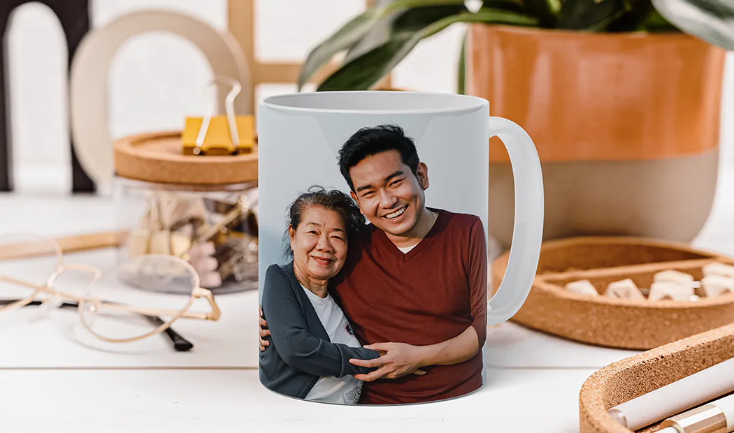 Personalised photo mug with picture of baby crawling wearing animal overall