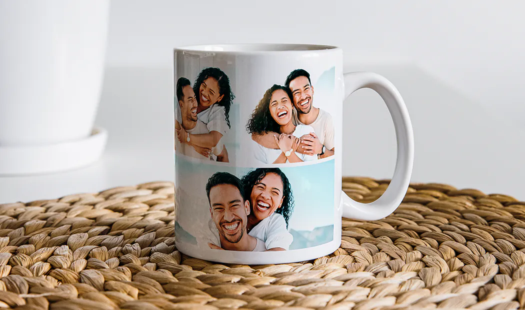 Close up of custom photo mug with a photo collage of family photos and text
