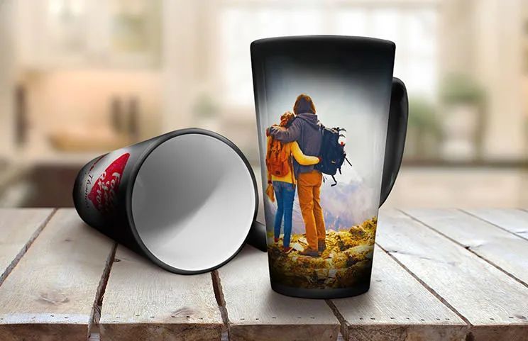 Two magic heat changing latte mugs with holiday photos and personalised text
