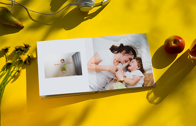 Personalized photo book printed with pictures of the football team and the photo cover