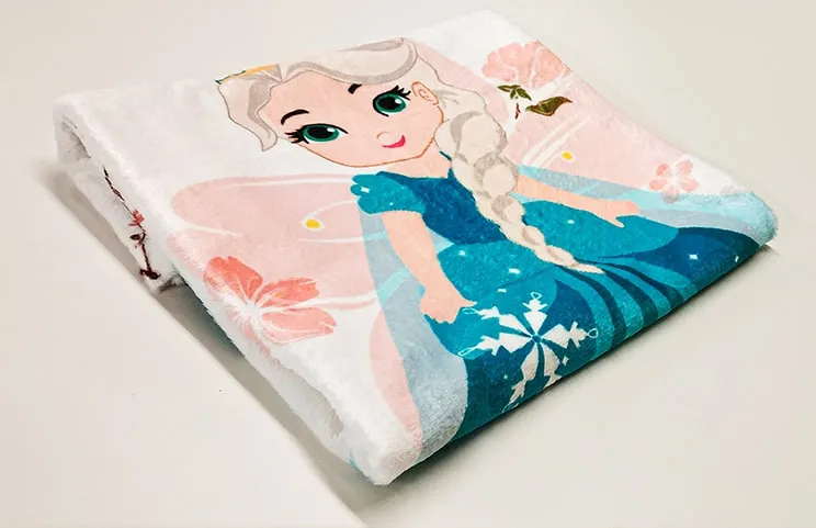 Close up photo of blue folded custom princess blanket
