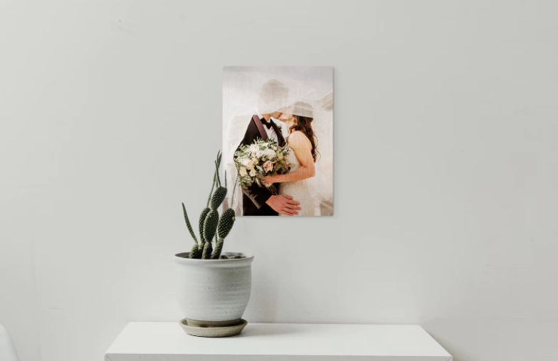 A metal print of a bridge with a city skyline in the background