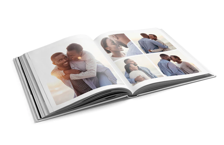 Pet and woman looking at personalised family photo book with custom design