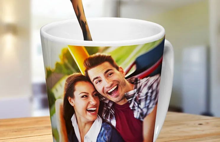 Coffee mug with photo of young couple printed on it